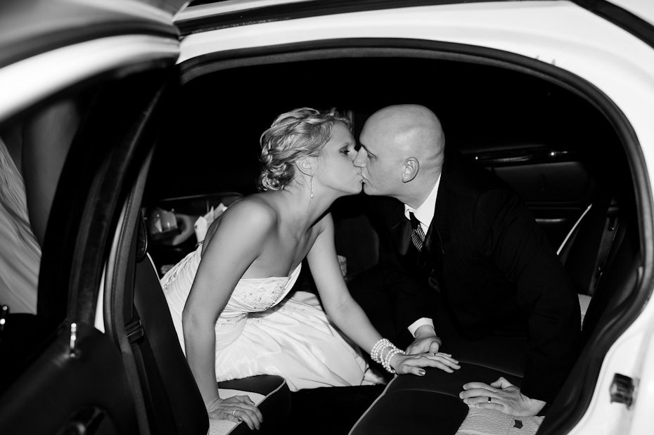 newlyweds cute couple kissing in limo