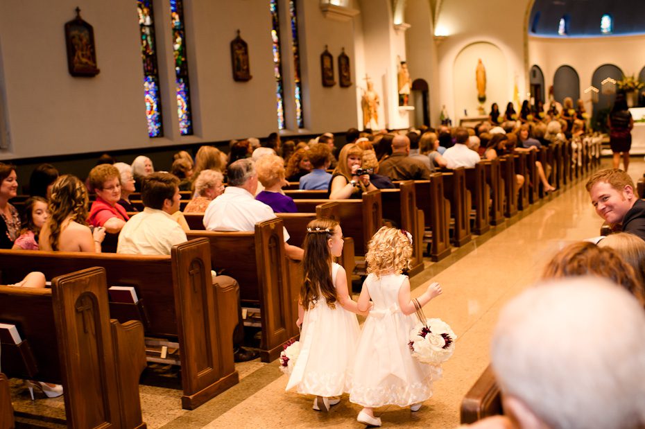 flower_girls_walking_down_aisle_wedding_ceremony