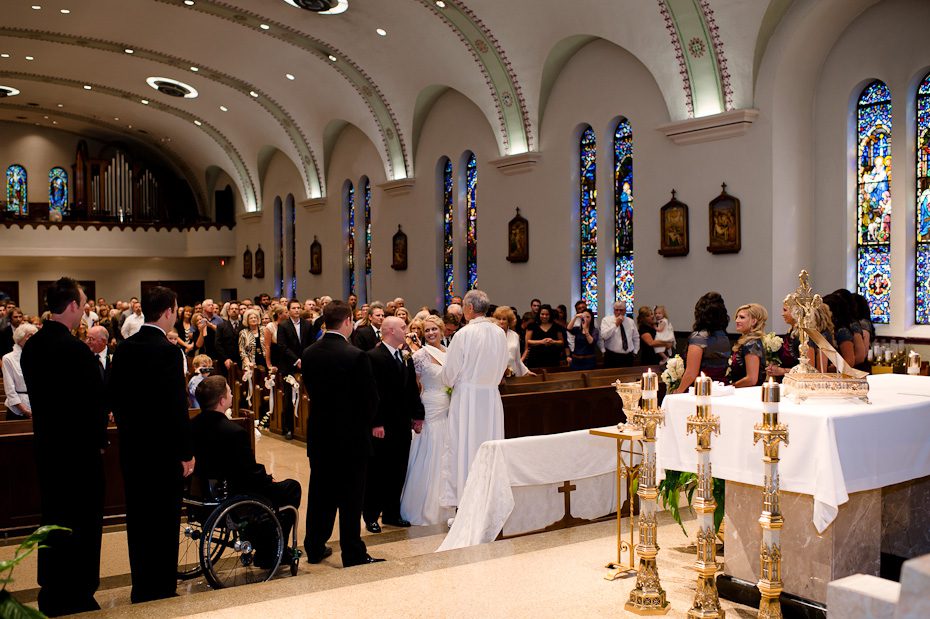 bride_smiling_groom_altar_church_wedding_ceremony