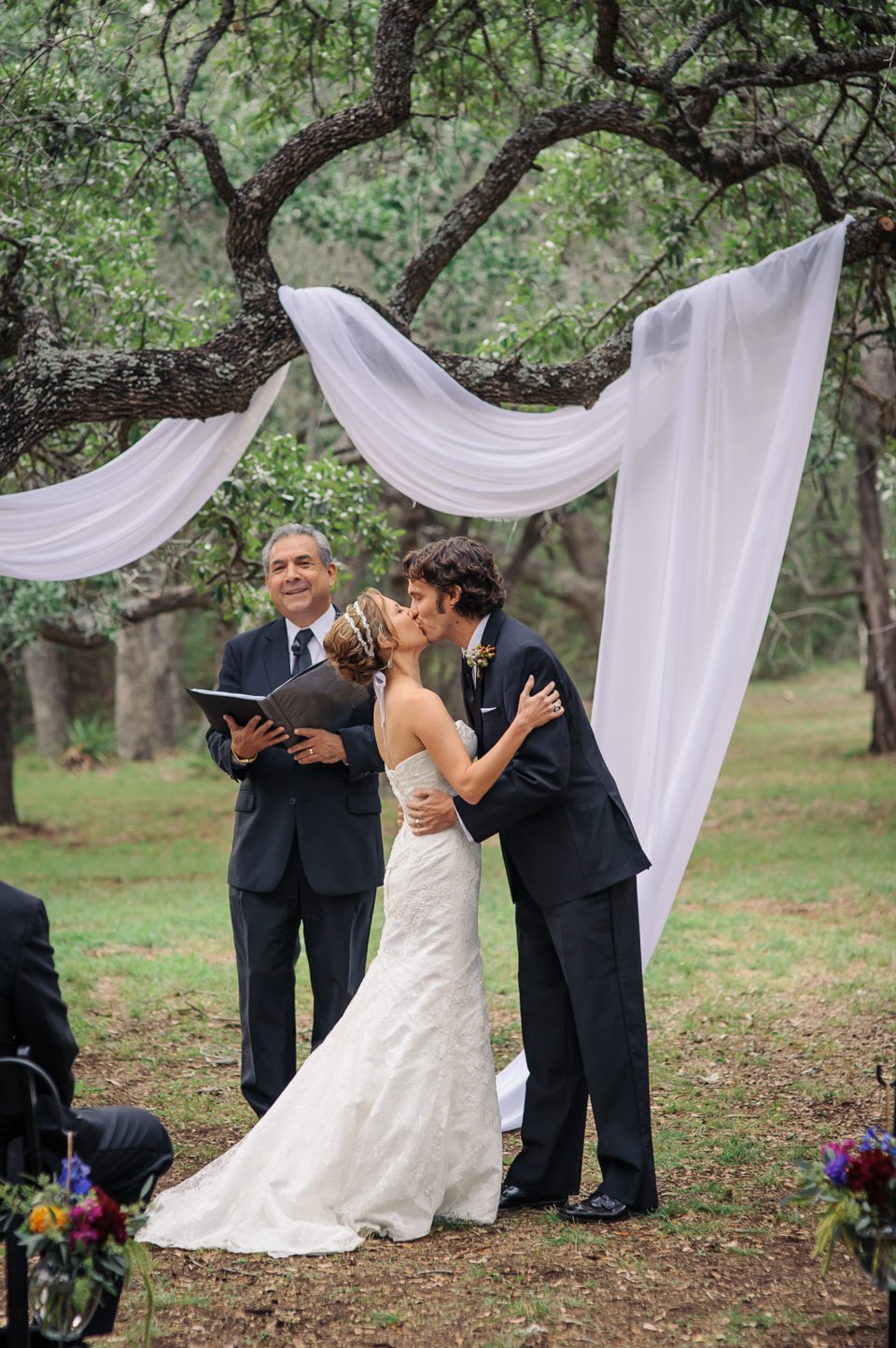 bride groom kissing