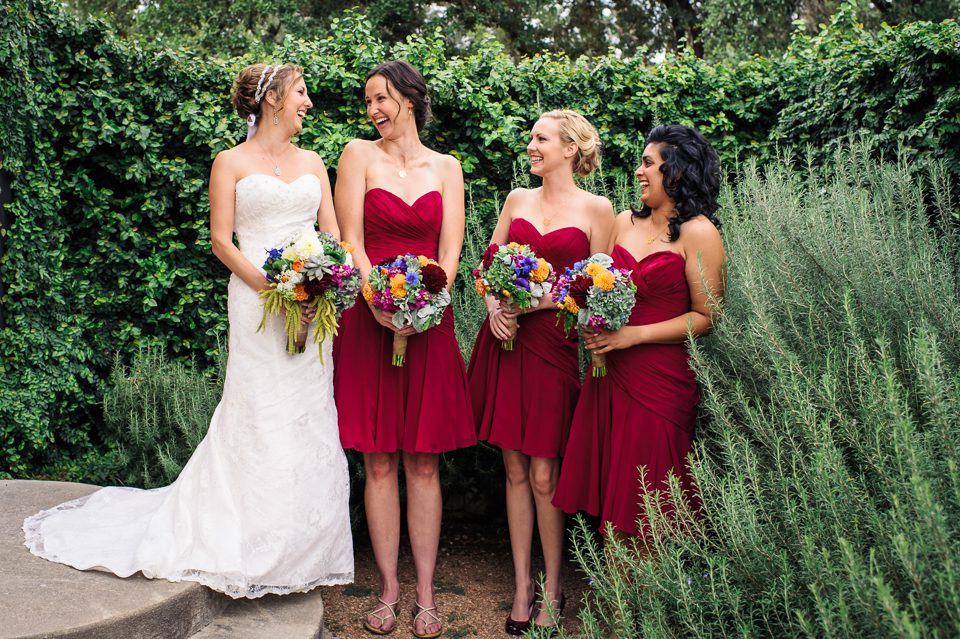 bride and bridesmaids laughing